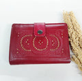 handmade bohemian leather wallet with traditional hand carved pattern from Indonesia